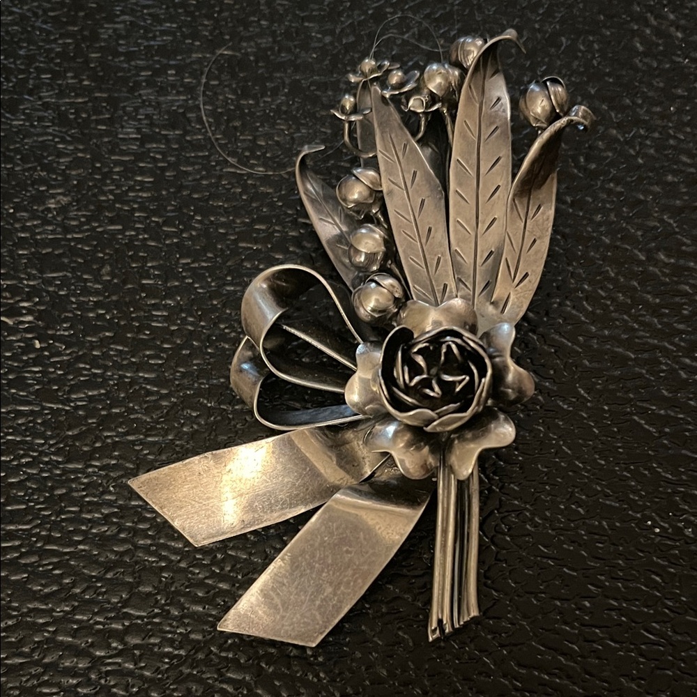 Three dimensional vintage  Hobe Silver Floral Brooch